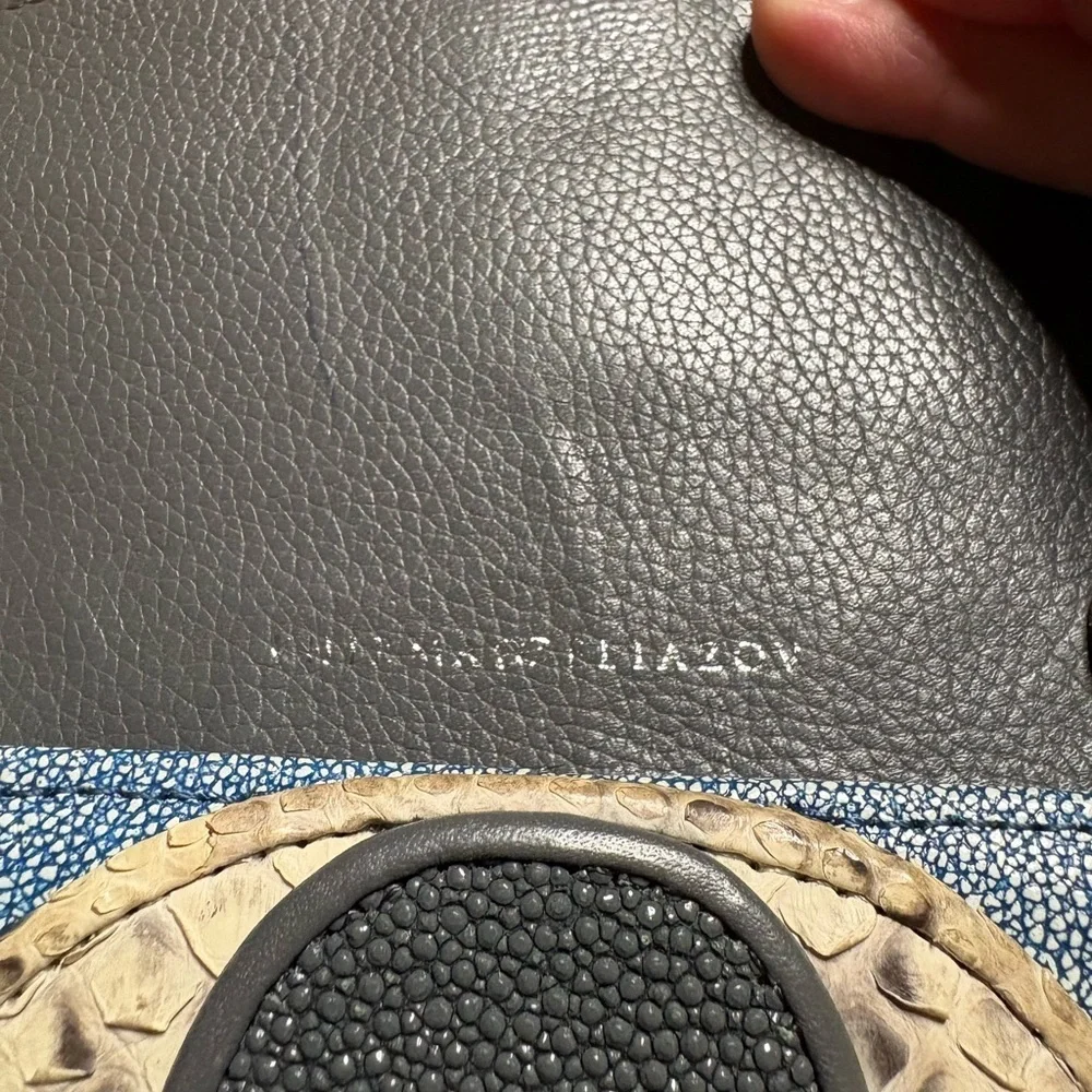 Khirma Eliazov Scalloped Clutch featuring stingray and python panels